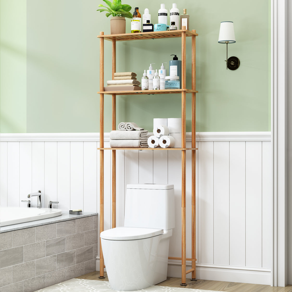 Bathroom with a bamboo wooden storage shelf against a green wall, holding various toiletries.