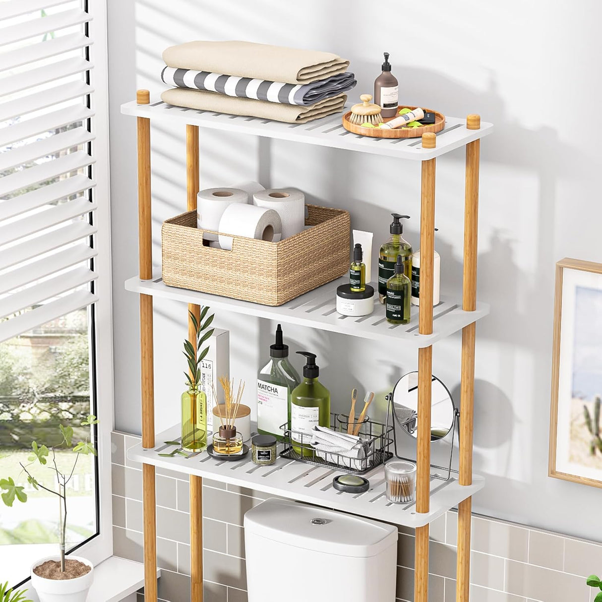Bathroom shelving unit with various items on a white wall background