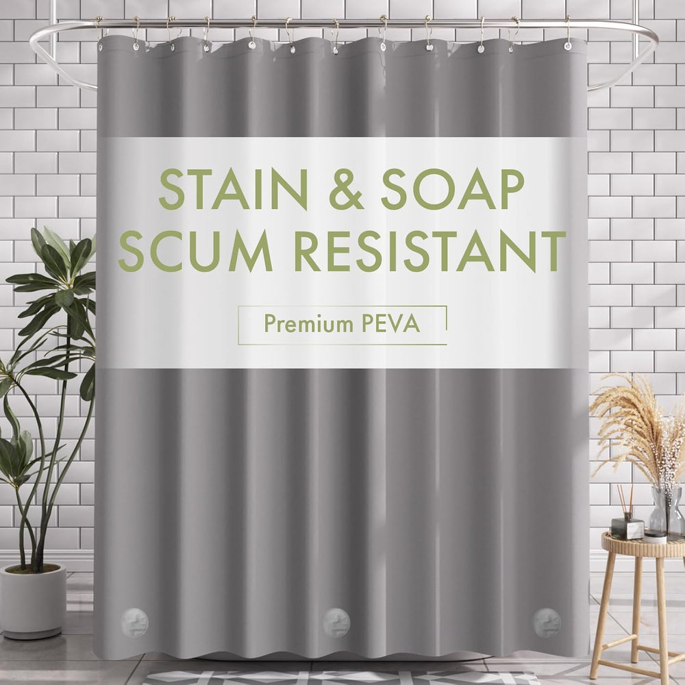 Gray shower curtain with 'Stain & Soap Scum Resistant' text in a bathroom setting