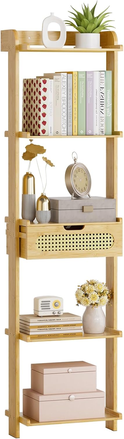 Wooden shelf with books, decorative items, and plants on a wooden floor.