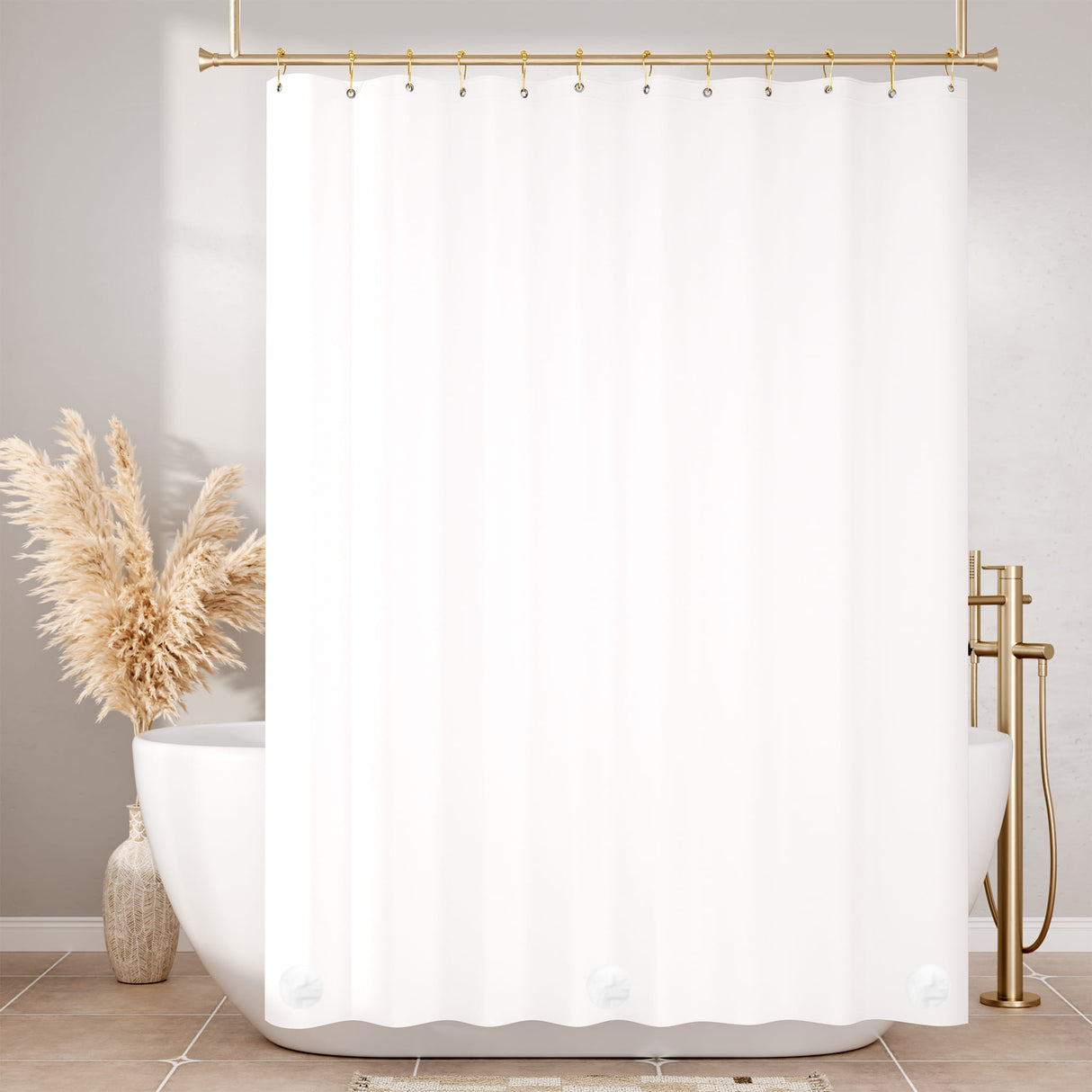 White shower curtain with gold fixtures and decorative elements in a bathroom setting.