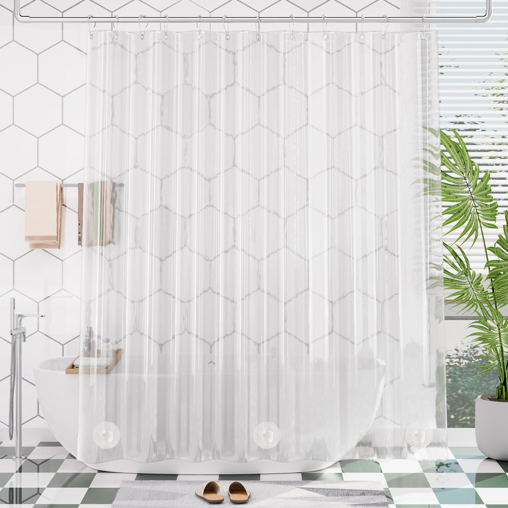 Heavy dute clear shower curtain with geometric pattern in a bathroom setting