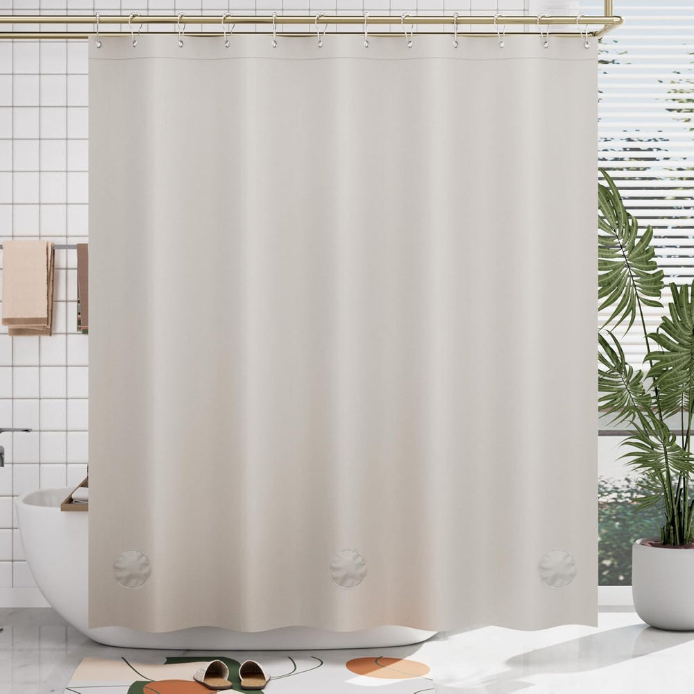 Beige shower curtain liner with leaf patterns in a bathroom setting