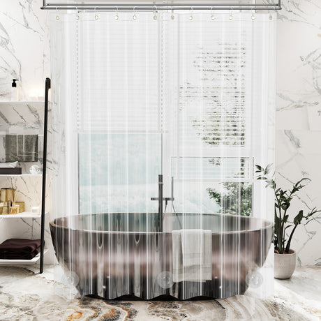 Modern bathroom with a freestanding bathtub, shower curtain liner, and marble walls.