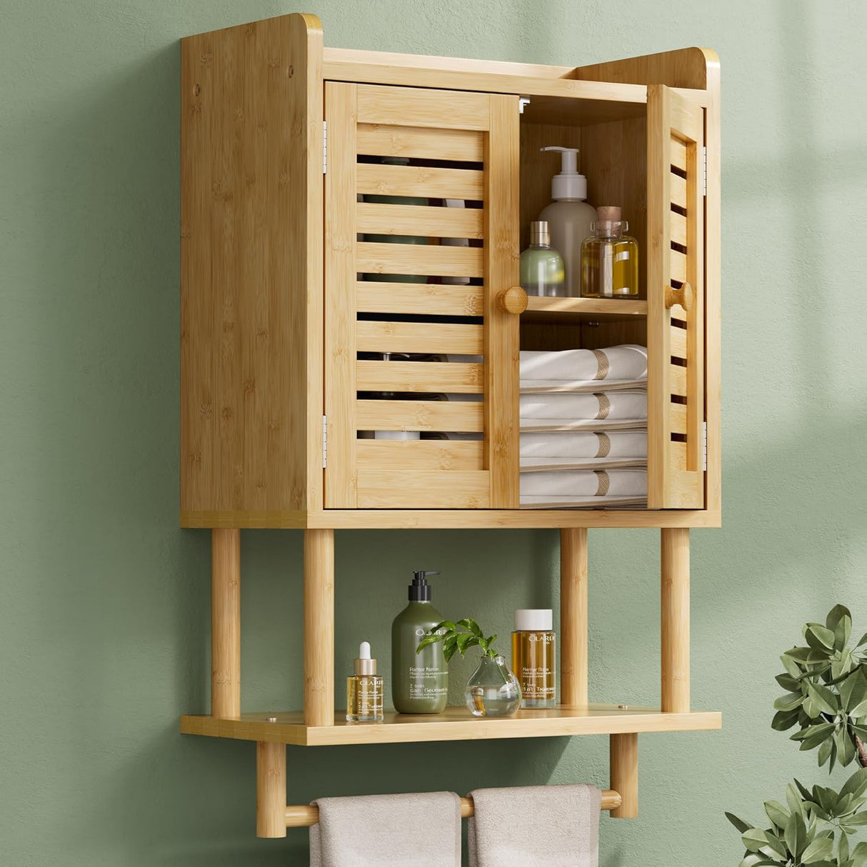 Bamboo wall-mounted cabinet with shelves against a green wall