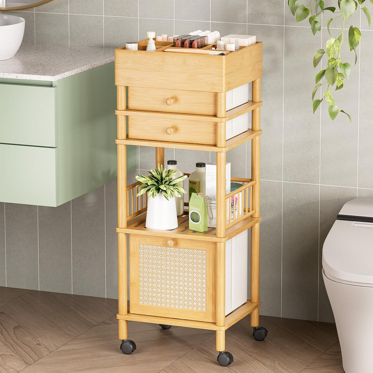 Bathroom storage cart with drawers and shelves against a tiled wall.