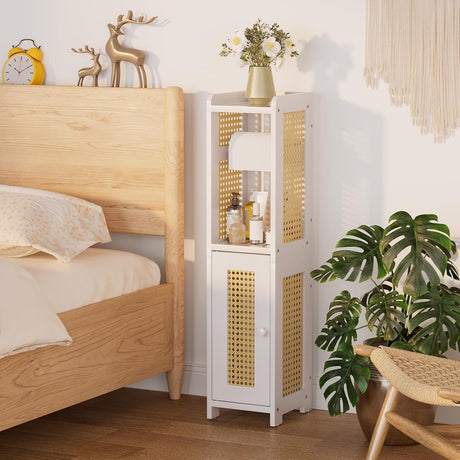 Bedroom with wooden bed, white nightstand with wicker design, and decorative items.