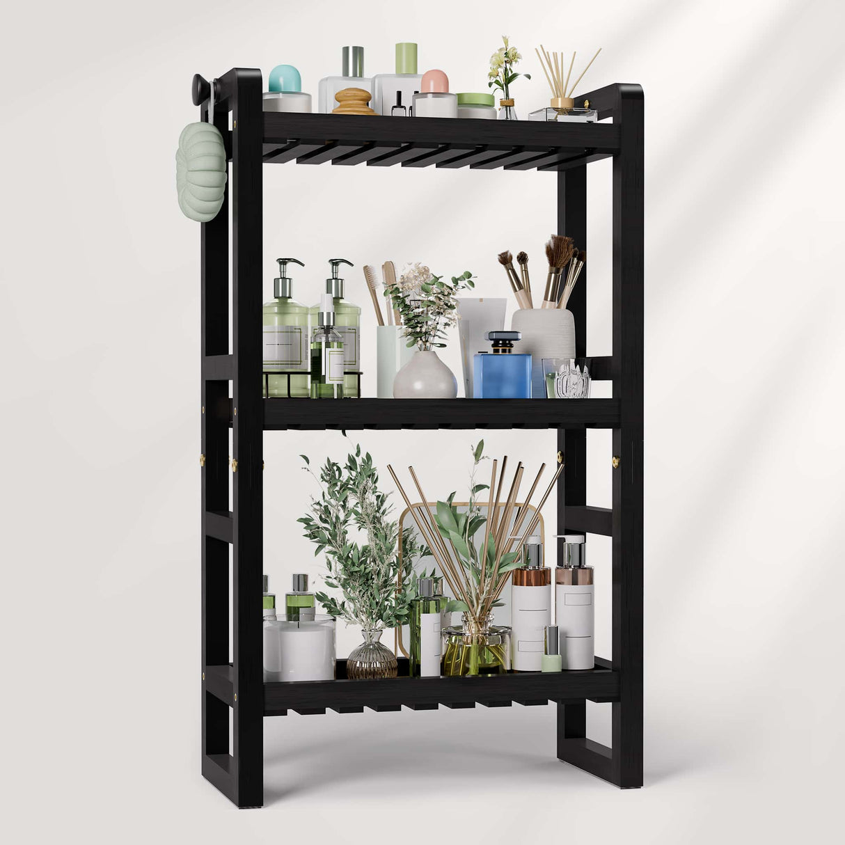 Black shelving unit with various decorative items on a white background