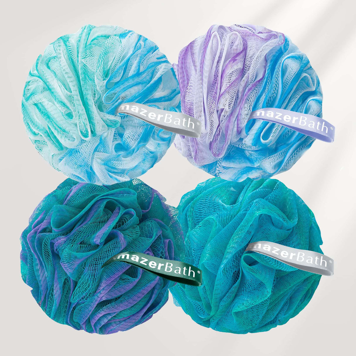 Four mesh bath poufs in blue, purple, and green with 'nazerBath' branding on a light gray background.