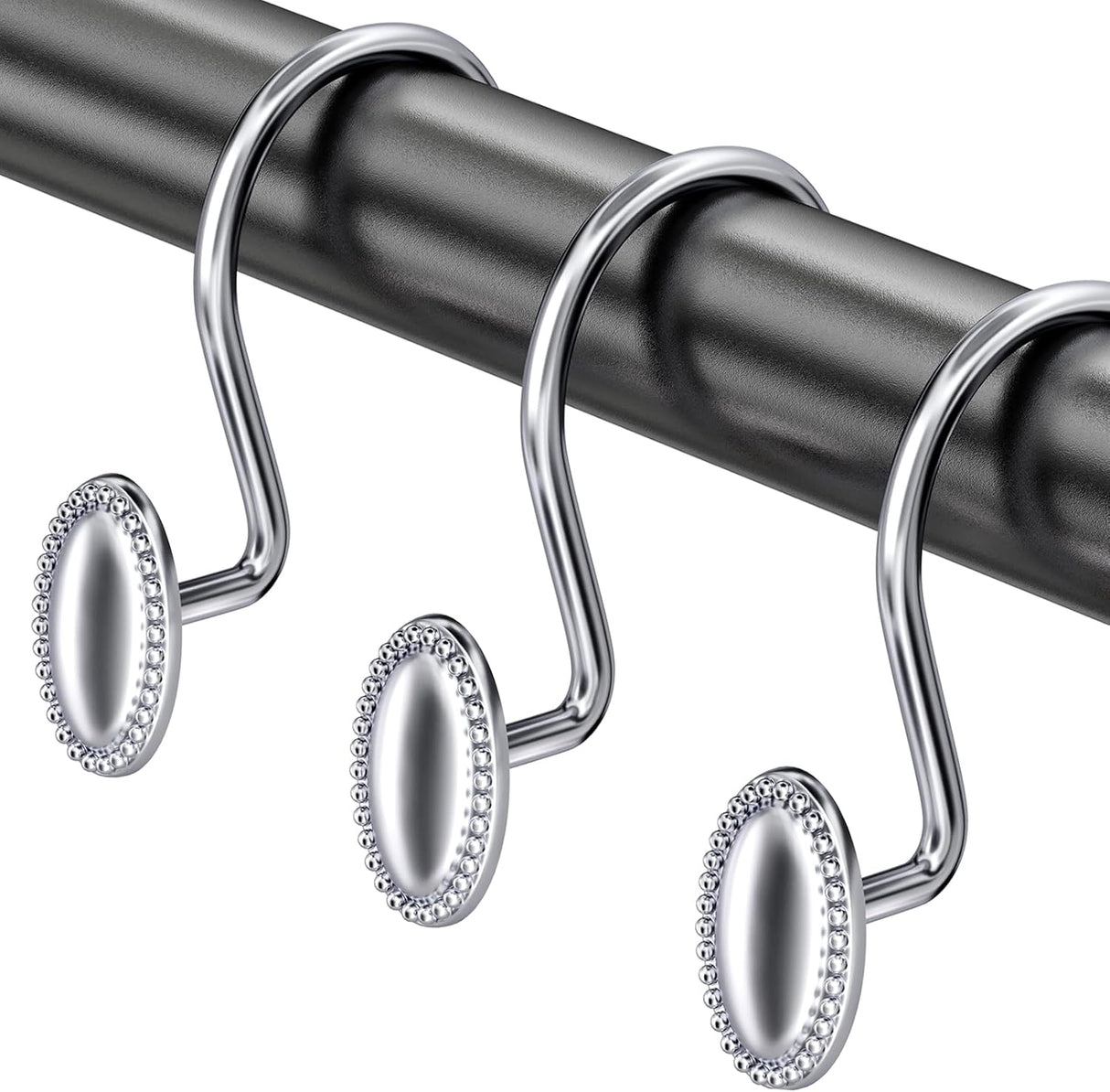 Silver curtain hooks on a black rod against a white background
