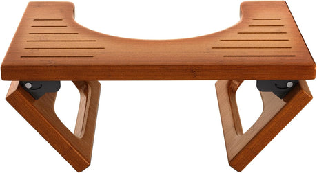 Wooden folding stool on a white background