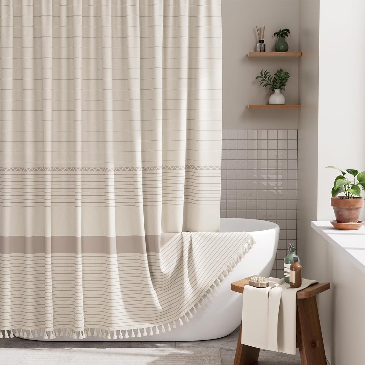 Bathroom with a white bathtub and shower curtain, wooden stool with towel, and plants.
