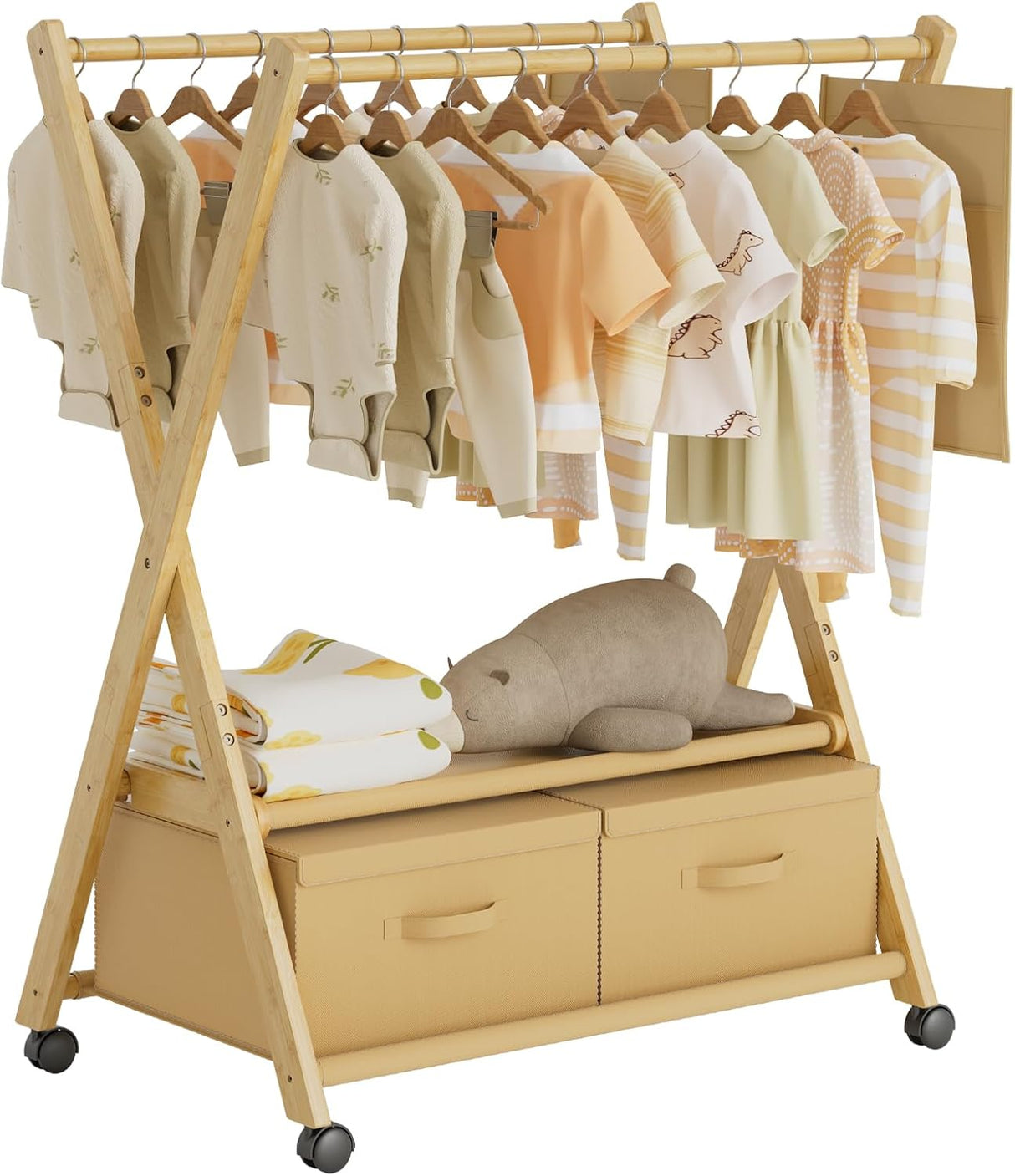 Wooden clothing rack with clothes and a plush toy on a white background