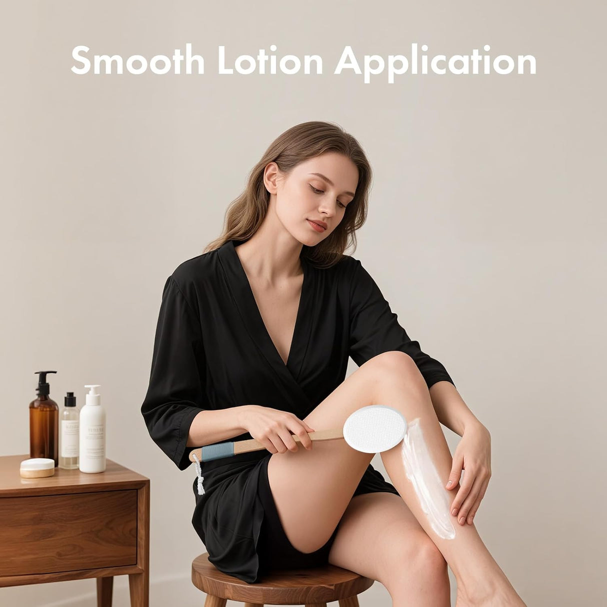 Woman applying lotion to her leg with a brush, surrounded by skincare products on a wooden table.