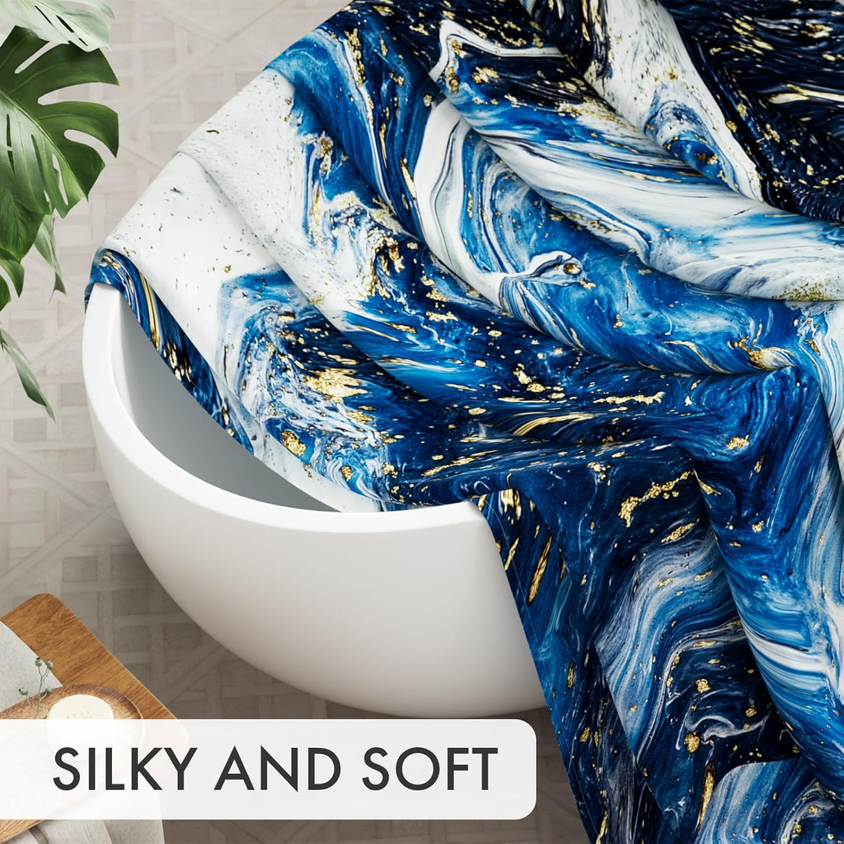Blue and white marbled fabric draped over a white bowl with 'SILKY AND SOFT' text.