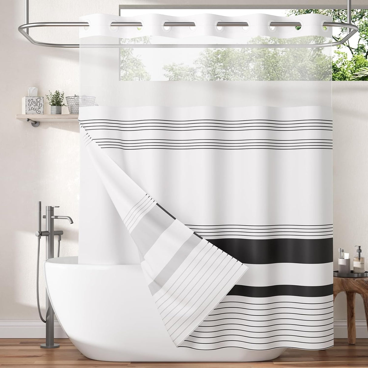 Striped shower curtain with a white bathtub and bathroom decor.