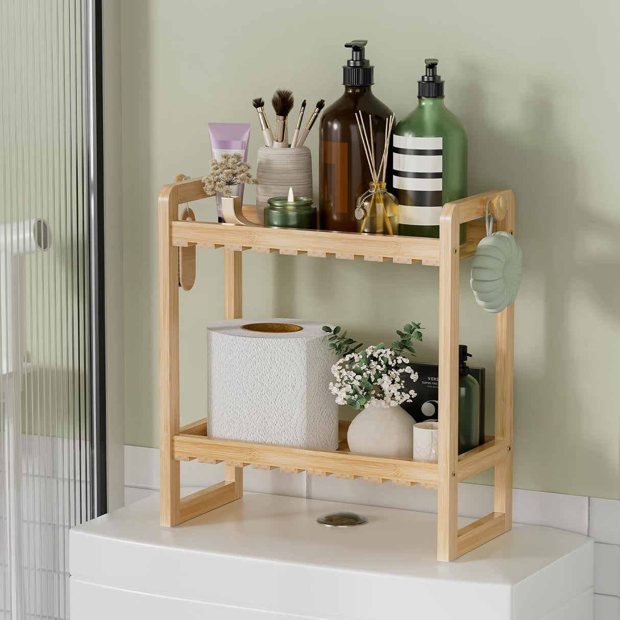 Bathroom shelf with various items against a light green wall