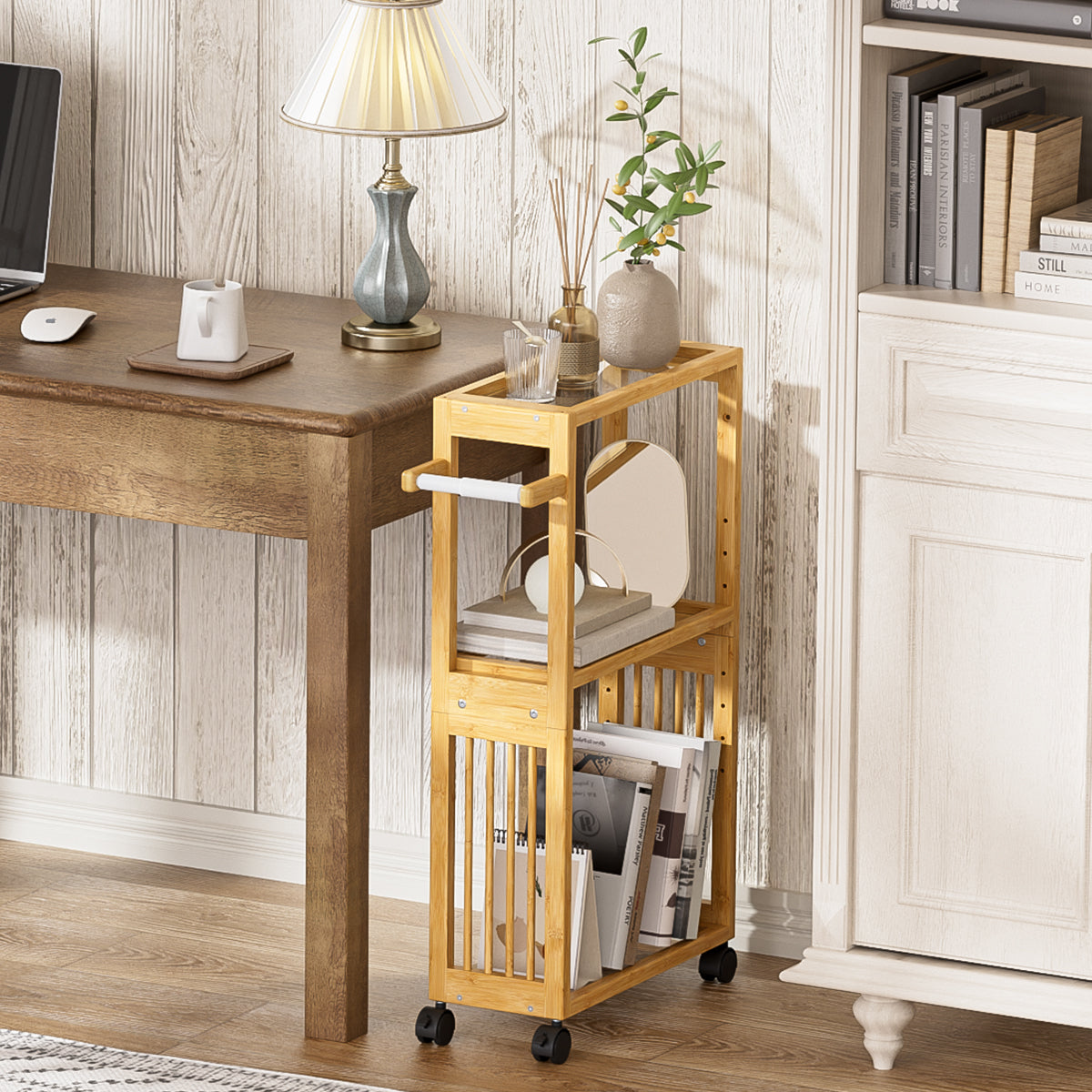 Bamboo rolling cart under a desk with books and papers in a home office setting.