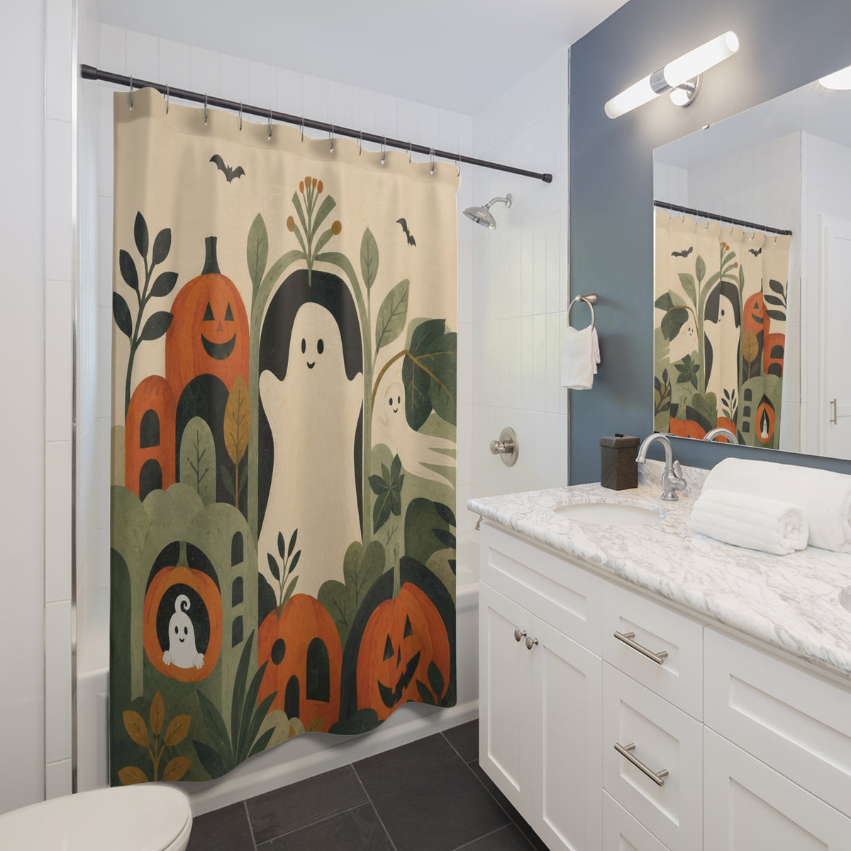 Boho Ghosts & Pumpkins Halloween Shower Curtain shown beside a bathroom vanity