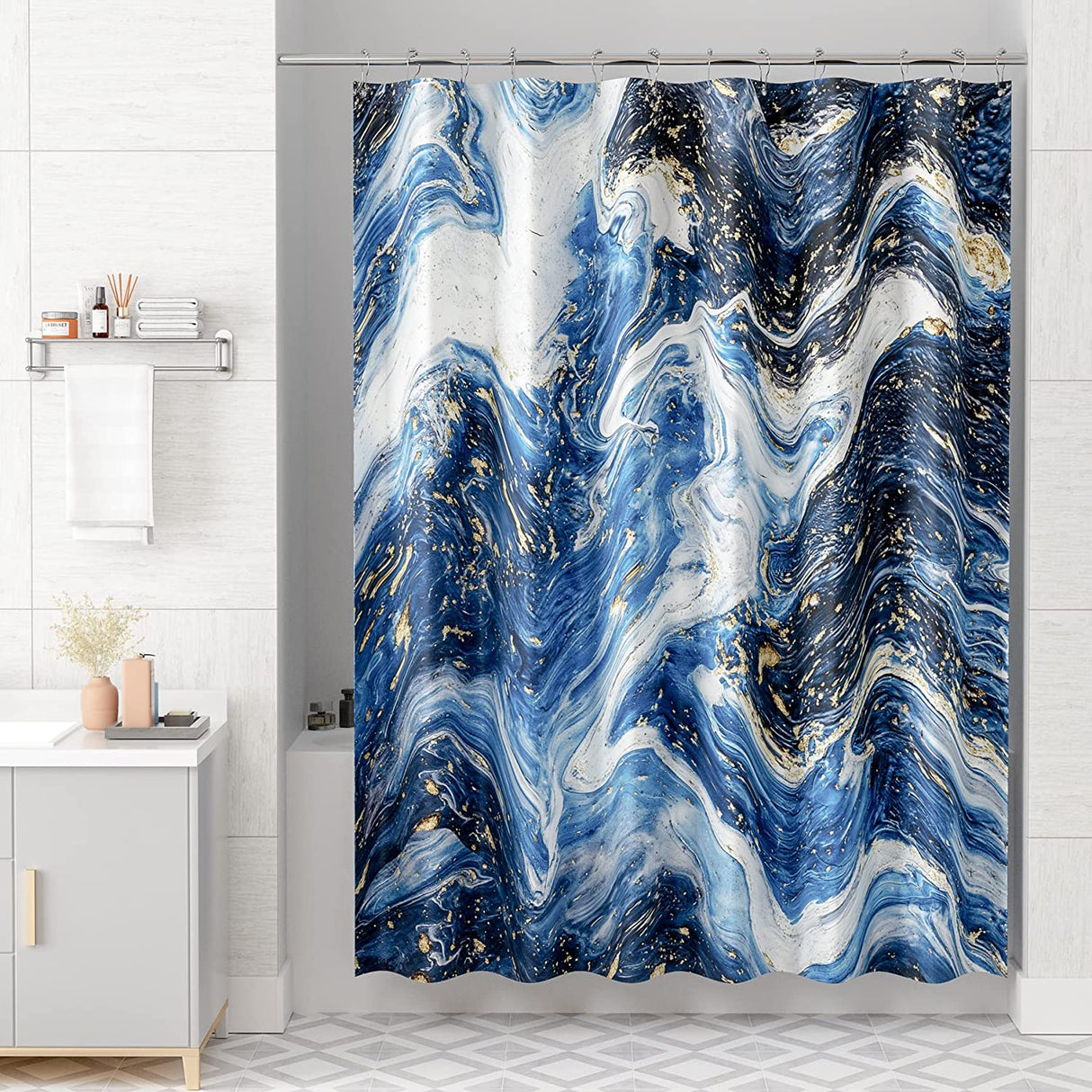 A shower curtain with a gradient of gray shades, darker at the bottom and lighter at the top, hanging on a rod in a bathroom setting.