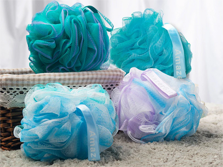 Colorful bath loofah sponges arranged for everyday shower use