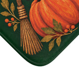 AmazerBath Halloween bath mat corner with green pumpkins, cauldron, black cat, and broom, vivid print, soft texture, and a bound edge.