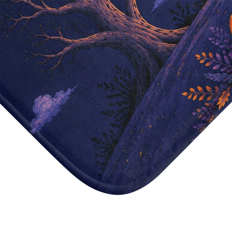 AmazerBath Halloween bath mat corner with haunted house, full moon, and glowing pumpkins, vivid print, soft texture, and a bound edge.