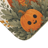 AmazerBath Halloween bath mat corner with white ghost, autumn wreath, and pumpkins, vivid print, soft texture, and a bound edge.