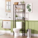 Bathroom with a toilet, over-the-toilet shelf, and decorative elements.