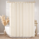 Beige shower curtain liner in a bathroom with a bathtub and decorative elements.