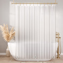 Frosted shower curtain liner with gold fixtures in a bathroom setting