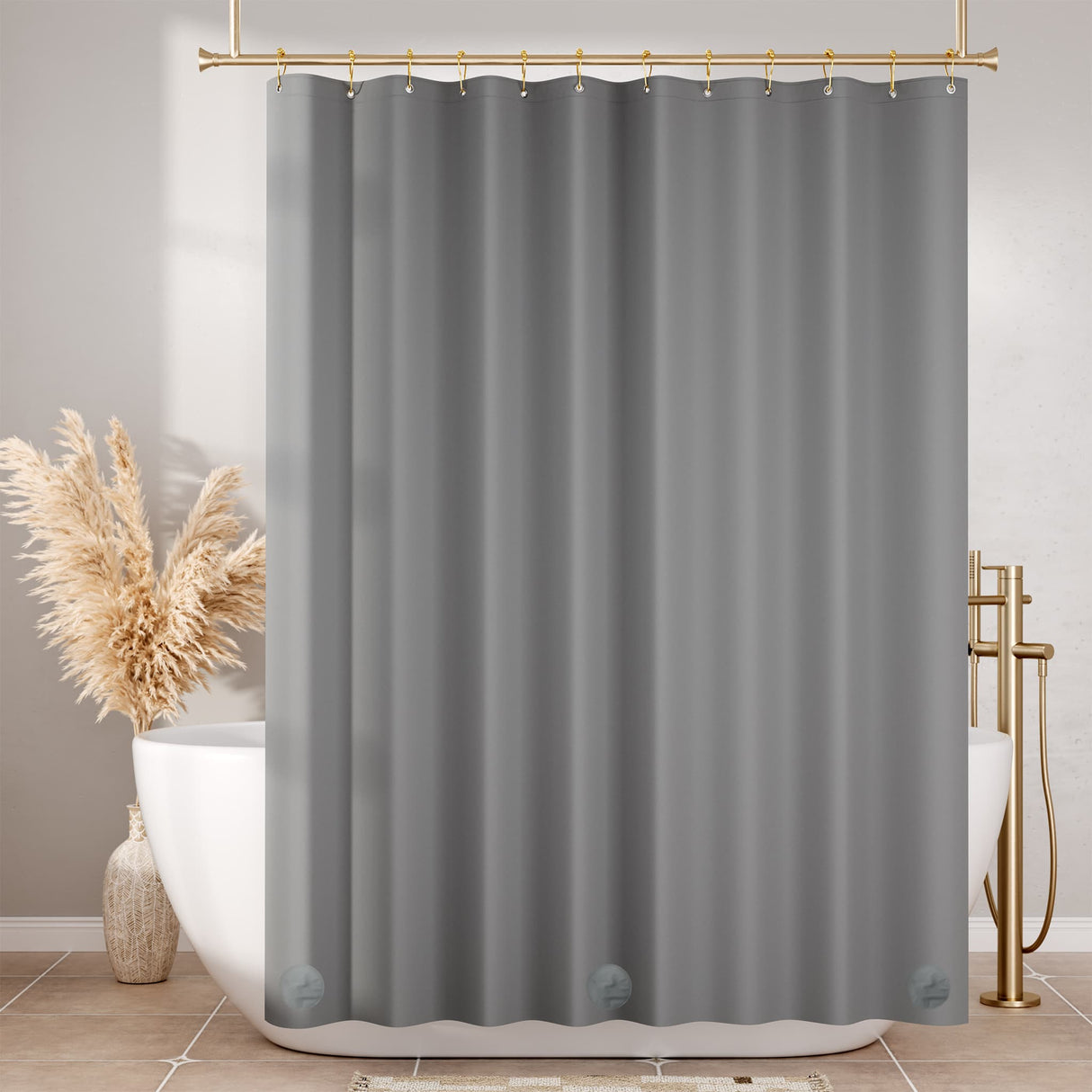 Gray shower curtain hanging in a bathroom with a bathtub and decorative elements.