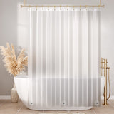 White shower curtain in a bathroom with a bathtub and decorative elements.