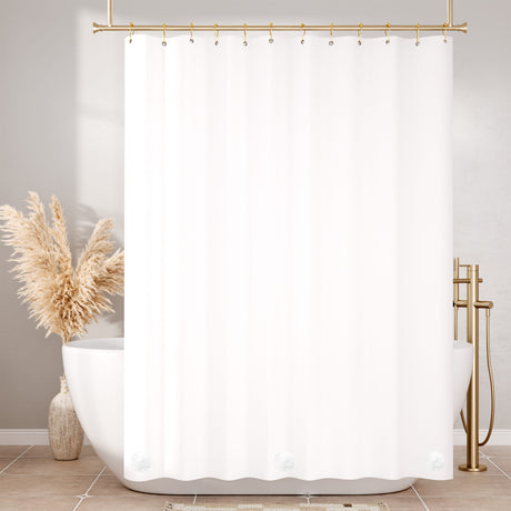 White shower curtain with gold fixtures and decorative elements in a bathroom setting.