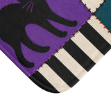 AmazerBath Halloween bath mat corner with patchwork cat, ghost, and jack-o'-lantern, vivid print, soft texture, and a bound edge.