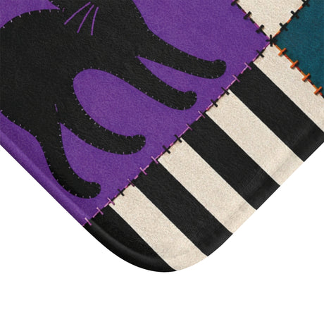 AmazerBath Halloween bath mat corner with patchwork cat, ghost, and jack-o'-lantern, vivid print, soft texture, and a bound edge.