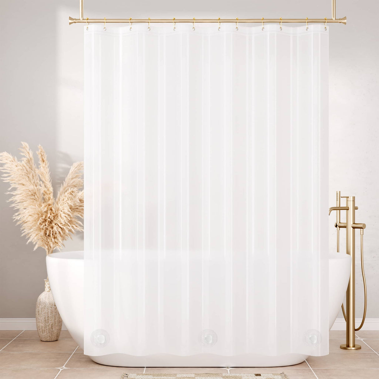 White shower curtain with a gold rod in a bathroom setting.