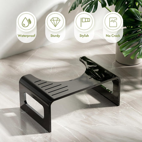 Black shelf on a marble surface with product features icons and a plant in the background