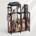 A black metal guitar and instrument storage rack holding multiple acoustic.
