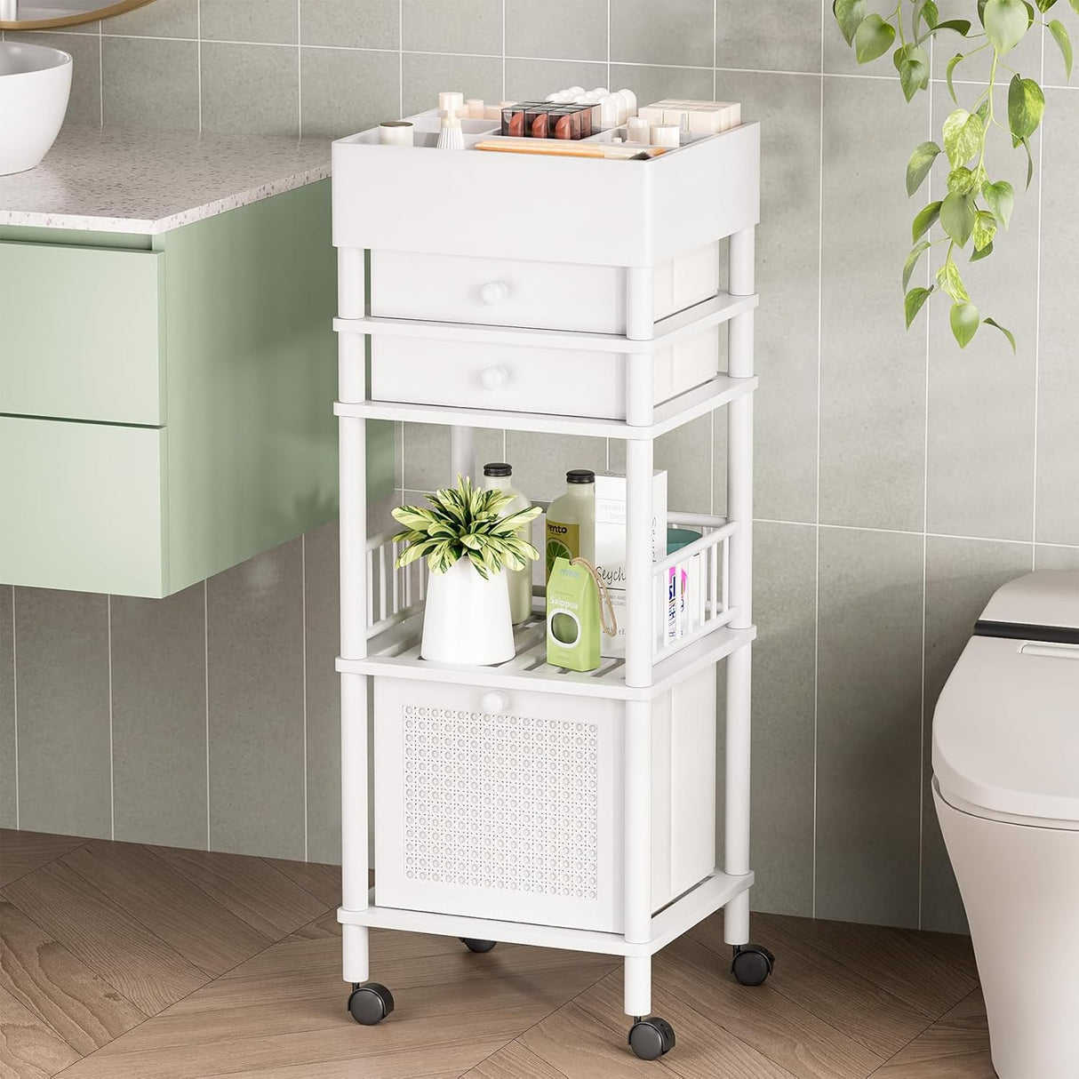 White rolling storage cart in a bathroom with various items on shelves.
