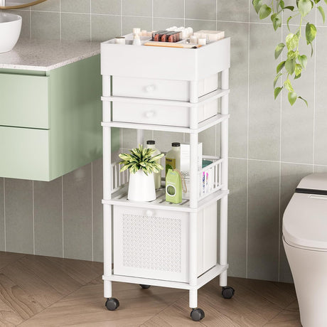 White rolling storage cart in a bathroom with various items on shelves.