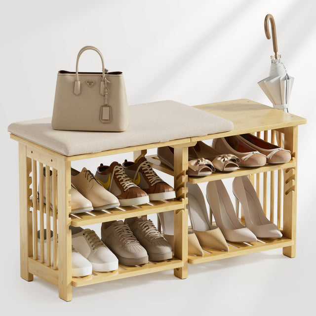 Wooden shoe rack with shoes, a handbag, and an umbrella on a white background