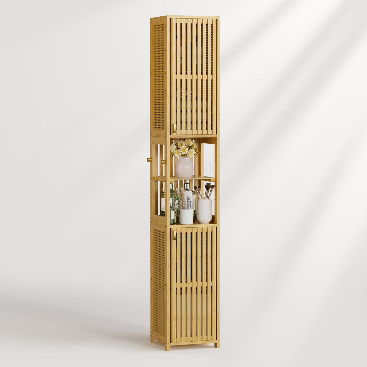 Tall bamboo shelf with decorative items on a white background