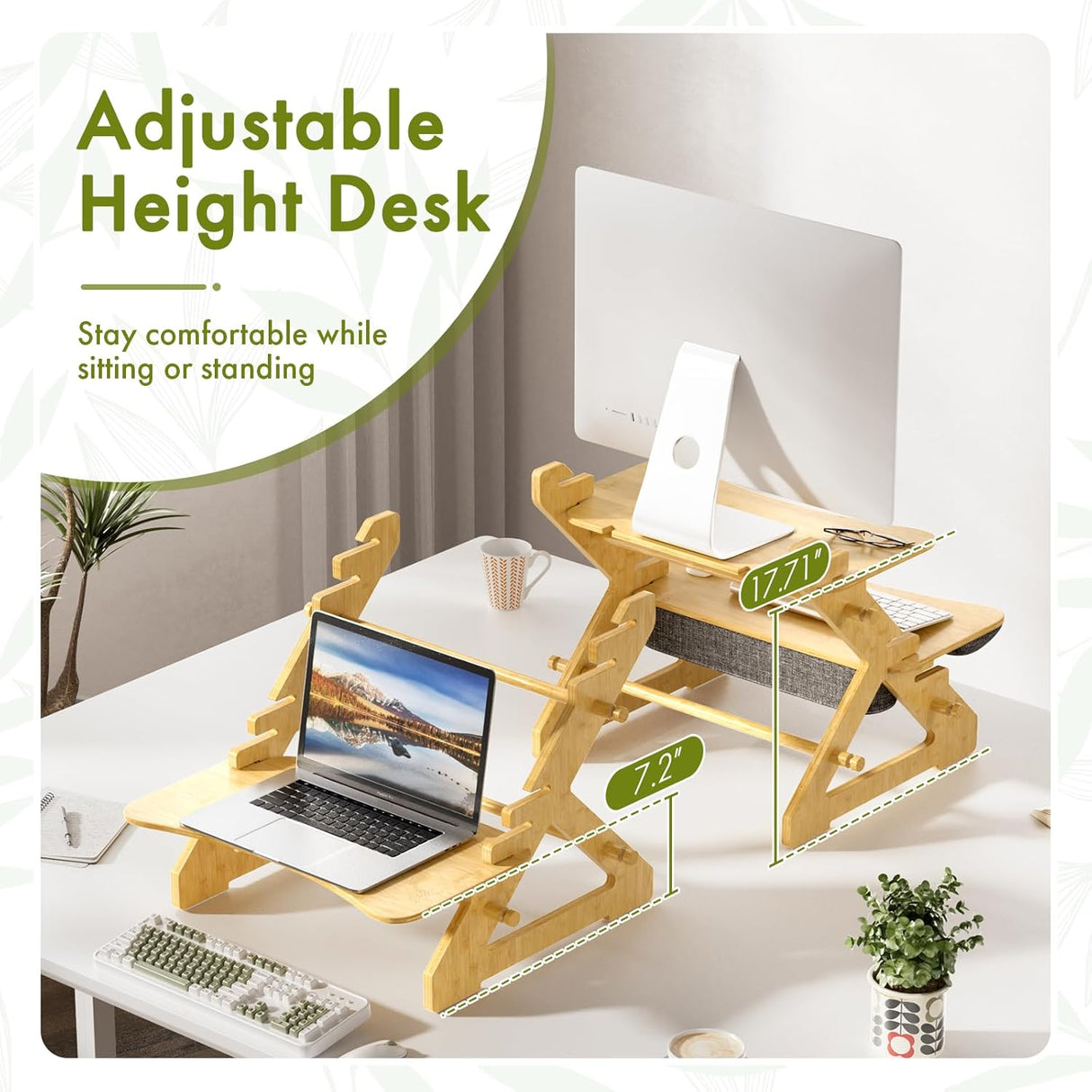 Adjustable height desk with laptop on a white desk setup
