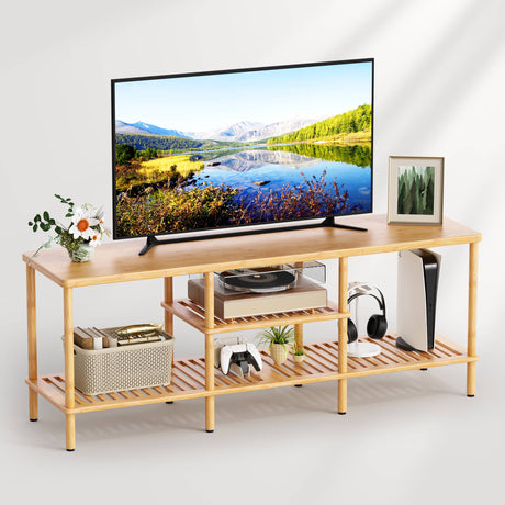Wooden TV stand with a television displaying a nature scene, surrounded by decorative items.