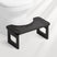 AmazerBath black bamboo toilet stool, 6.8-inch nonfoldable squat potty stool shown with a white toilet.