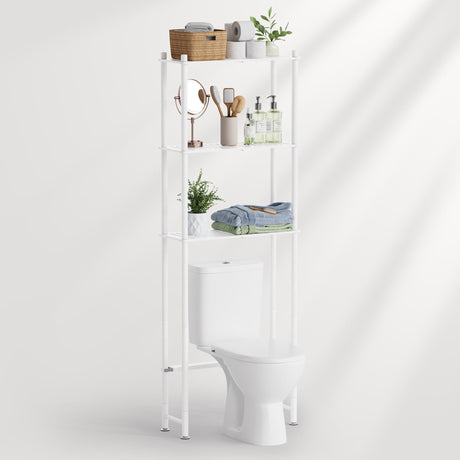 White over-the-toilet storage cabinet with bathroom items on a white background