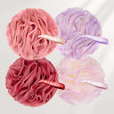 Four mesh bath poufs in pink, purple, red, and multicolor with 'amazerBath' branding on a light gray background.