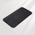 Black textured mat on a light gray background