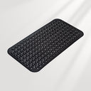 Black textured mat on a light gray background